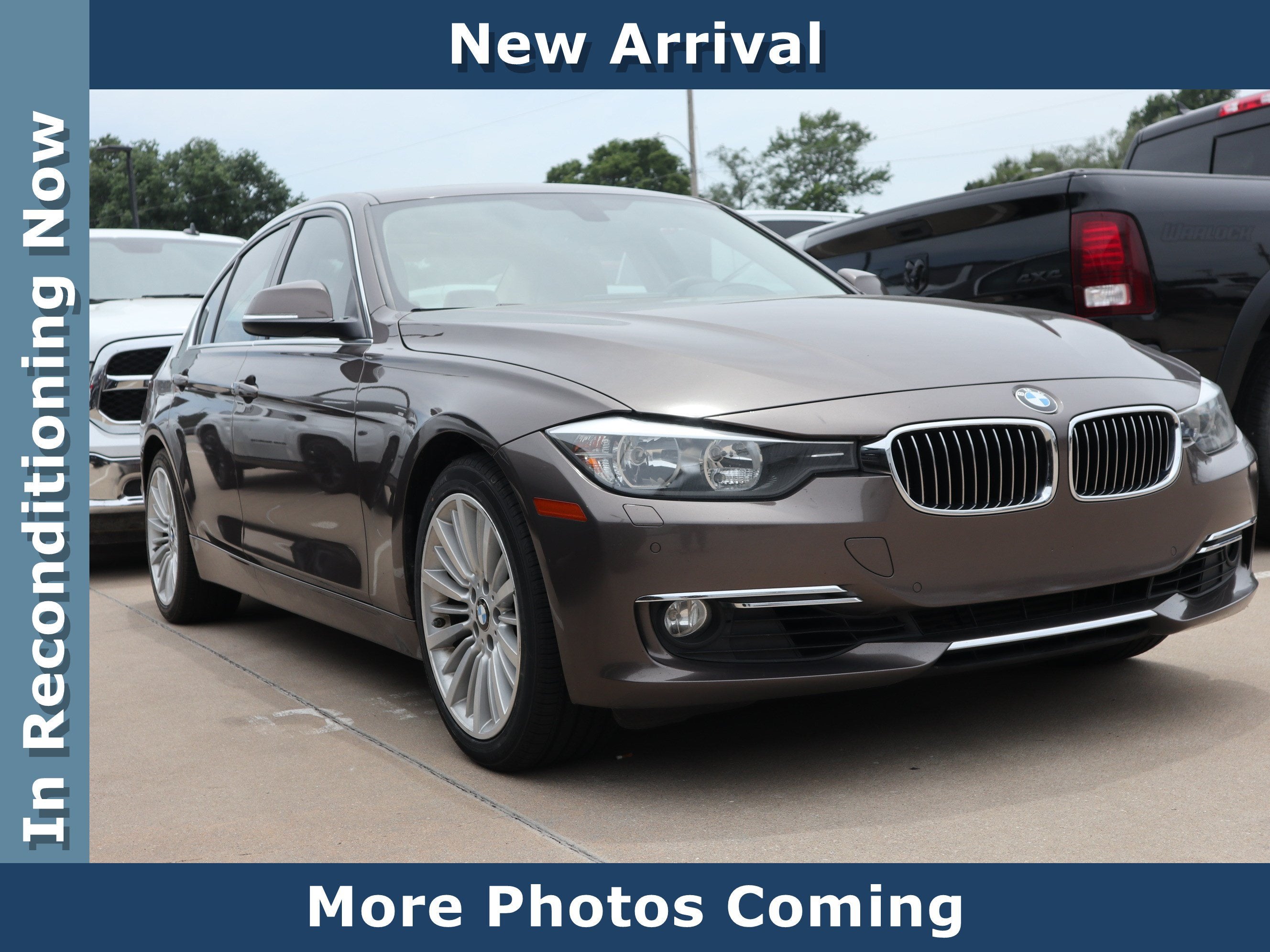 2013 BMW 3 Series 328i in Bronze Metallic — front three-quarter view