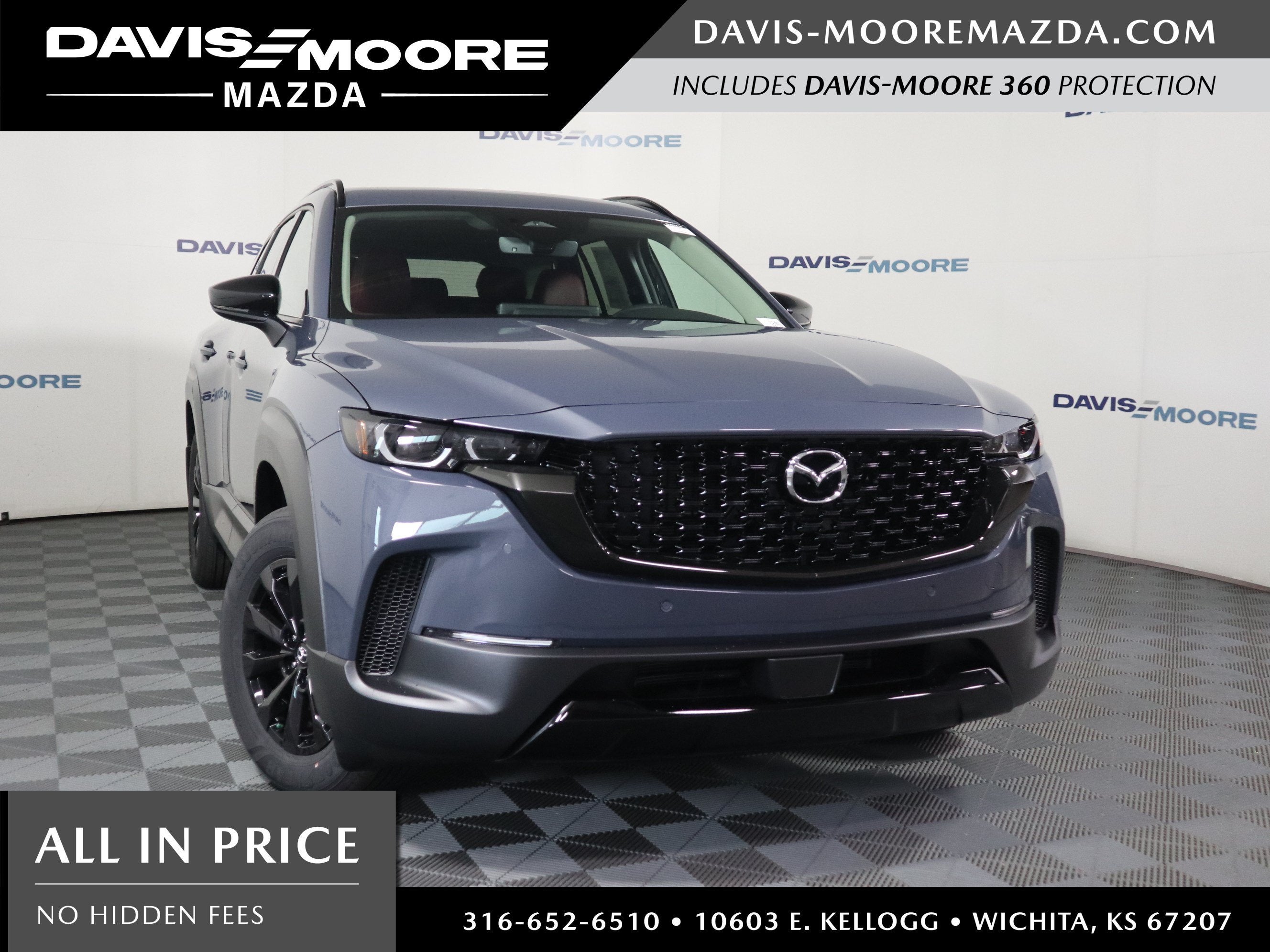 2026 Mazda Mazda CX-50 Hybrid Premium AWD in Polymetal Gray Metallic — front three-quarter view