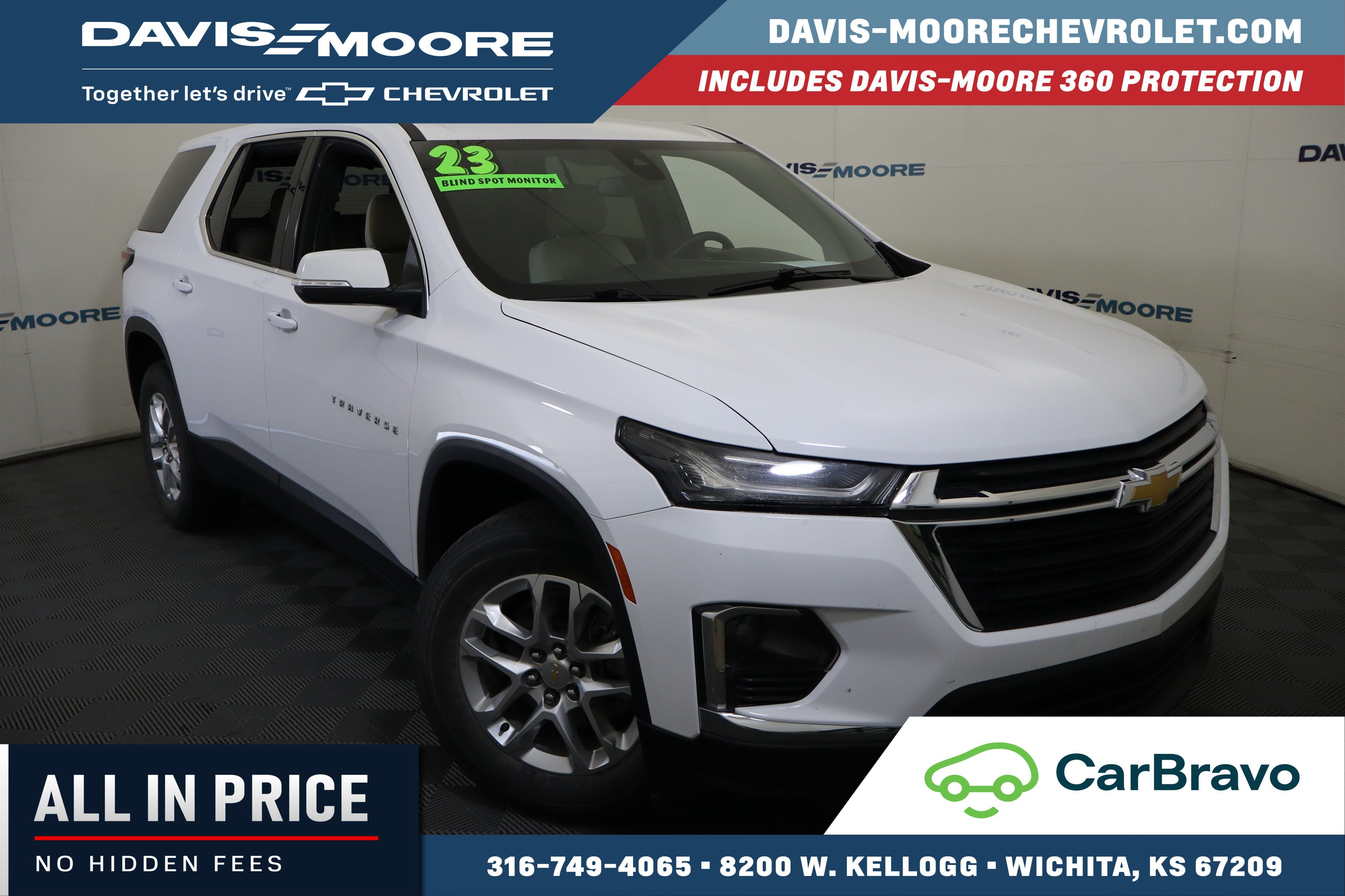 2023 Chevrolet Traverse LS in Summit White — front three-quarter view
